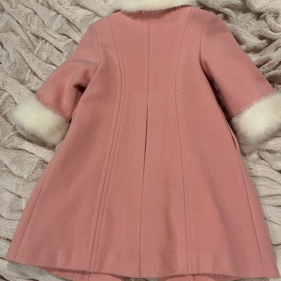 Pink Faux Fur coat. Elegant coat features a hand warmer plush accessory. - Picture 3 of 7
